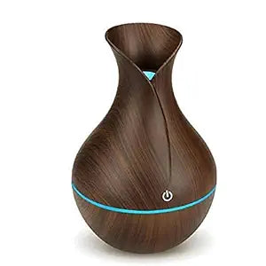 Experience the Maurice Electric Oil Humidifier with 7 mood-changing LED lights and a free essential oil.
