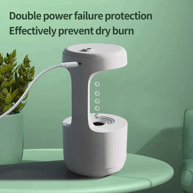 Futuristic water drop mist maker and aroma diffuser designed to elevate your living space ambiance.